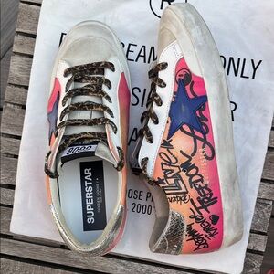 Golden Goose Women’s Sneakers with Pink-Orange Gradient and Blue Star